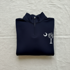 A navy blue quarter-zip sweatshirt with a white embroidered Southern cross tree and crescent moon logo on the left chest, displayed flat against a white background.